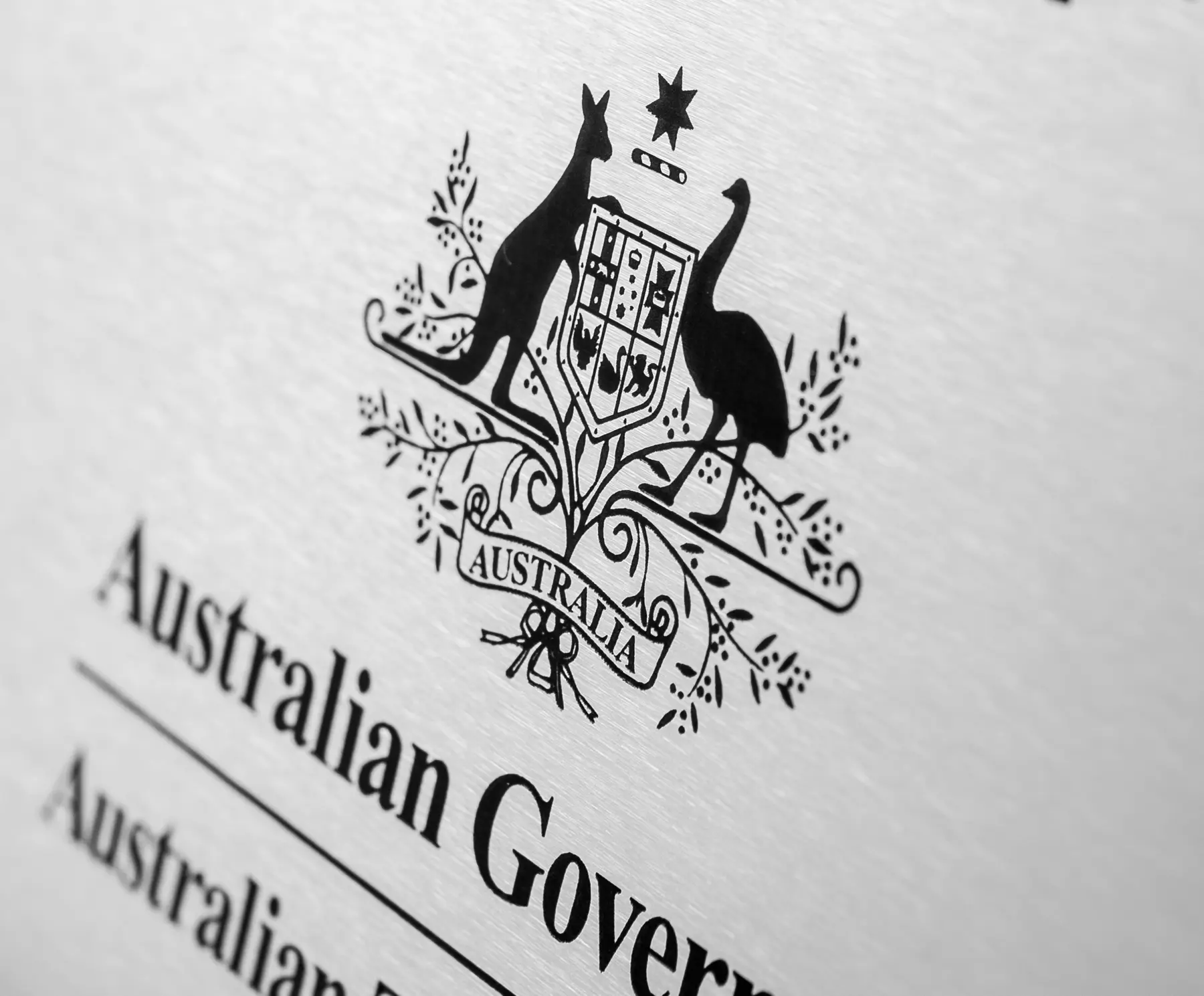 Stainless steel plate laser engraved with the Australian Government coat of arms